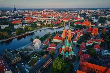 Wall Mural - Aerial view of Wroclaw old town with the Cathedral of st. John the Baptist and colorful buildings over Odra river. Tumski island - famous place for tourist visit in Poland