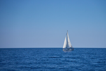 Luxurious yacht in sea on summer day. Summer vacation and tourism