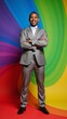 © Pixel Matrix - African American Gay Man Standing Tall Against Rainbow Backdrop Emblem of Love Inclusion  Equality