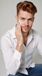 © Pixel Matrix - Gay Caucasian man with beautiful red hair follows his skincare routine for clean vibrant complexion