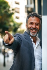 Poster - A businessman or executive pointing to a sign or advertisement, possibly indicating direction or importance