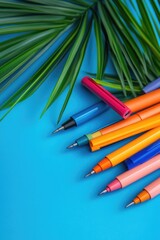 Aufkleber - a collection of pens arranged on a blue background
