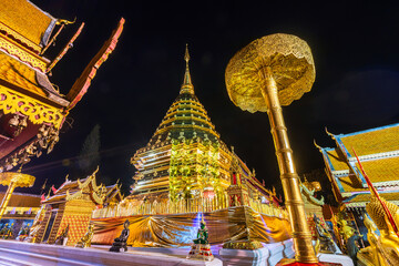 Wall Mural - Wat Phra That Doi Suthep is a Buddhist temple is a major tourist attraction Is an ancient Thai art with Twilight blue bright at dusk night and Public places in Chiang Mai,Thailand.