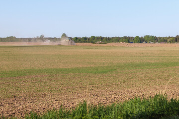 
landscape with a cultivated field of crops