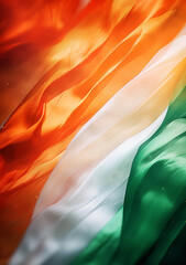 Wall Mural - Waving Irish flag in green, orange, and white background design.