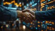 © Prostock-studio - Two business professionals engage in a handshake in a modern office. Digital screens displaying financial data and charts create a vibrant backdrop, highlighting a collaborative atmosphere.