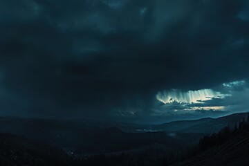 Wall Mural - a panoramic view of dark storm clouds gathering in the sky