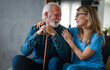 © Dragana Gordic - Happy Senior Man Enjoying Time with Caring Granddaughter