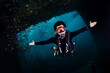 © zephyr_p - Male Scuba diver diving through a frame of wreck ship at King Cruiser wreck, a famous dive site near Phuket, Thailand. Enjoy advance underwater experience