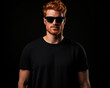 © ovid - Handsome ginger man isolated on black background