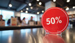 © Elfaa - Discount sign with a joyful atmosphere in a modern restaurant interior