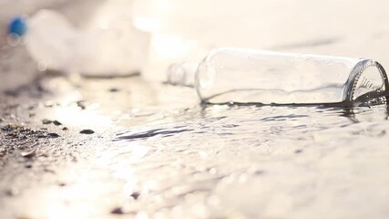 Wall Mural - bottle floating on water. glass and plastic bottle pollutes the river, the concept of recycling garb