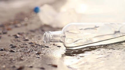 Wall Mural - bottle floating on water. glass and plastic bottle pollutes the river, the concept of recycling garb