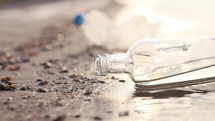 Wall Mural - bottle floating on water. glass and plastic bottle pollutes the river, the concept of recycling garb