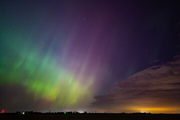 Wall Mural - Northern Lights Storm on May 11th 2024 from Iowa City, Iowa, USA with a cloud being illuminated by a light below. 5.11.24