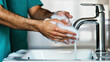 © kaliel - a surgeon washes his hands before operating. Hospital concept.