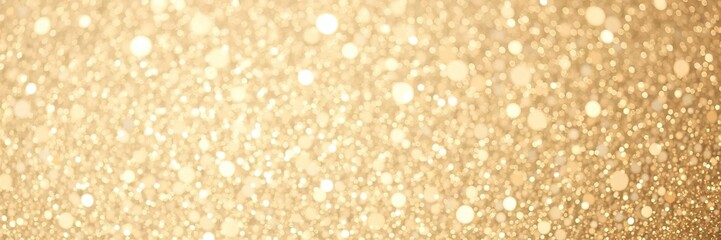 Wall Mural - Abstract background of shimmering light gold glitter, sparkly, festive
