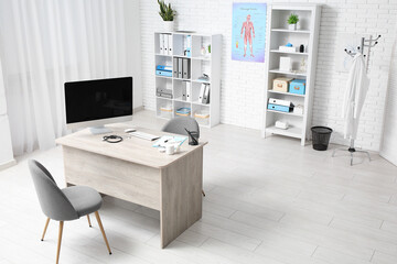 Sticker - Interior of medical office with doctor's workplace and shelf units