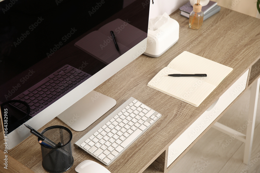 Notebook with pen on desk in office, closeup