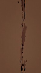Poster - Abstract dark streaks on a brown background, ideal for artistic and moody design projects