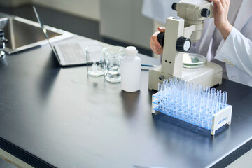 Poster - microscope, scientist, engineer, man, research, experiment, investigation, inspection, bio, biotechnology, botany, chemist, biochemistry, science, researcher, white coat, laboratory, research institut