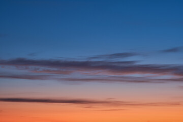 beautiful sunset and sunrise. dark moody blue and orange sunset sky. natural background. simple back