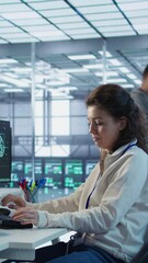 Aufkleber - upbeat computer scientist working in high tech server hub capable of processing vast amounts of data