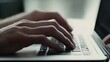 © Pascal - Close-up of hands typing on a laptop keyboard, showing productivity and focus with a simple, clean office background.