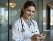 © Metehan - Happy woman doctor on tablet for employees management, hospital workflow and clinic staff solution on software or app. Healthcare manager on digital tech for medical team research or problem solving