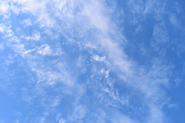 Wall Mural - beautiful blue sky and white fluffy group of clouds with sunrise in the morning, natural background