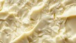 © Olga - Close up of a yellow melting cheese texture background