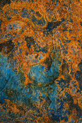 Wall Mural - Rusty metal surface with shabby background paint. Blue cracked paint texture on an iron sheet. Fragment of an old metal door, Metal corrosion.