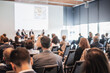 © kasto - Interview and round table discussion at business convention and presentation. Audience at the conference hall. Business and entrepreneurship symposium.
