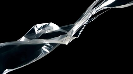 Poster - A transparent plastic film flowing elegantly against a black backdrop, revealing a stunning dance of light, shadow, and texture