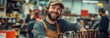 © I Have Photos - A brewery worker filling bottles of craft beer in an industrial setting, symbolizing smallbatch brewing