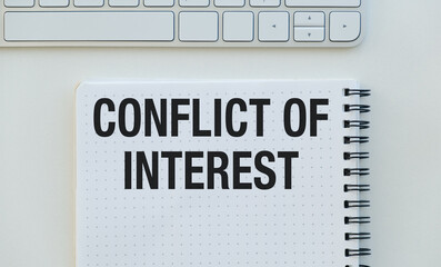 Conflict of interest, text words typography written on paper against white background, life and business motivational inspirational