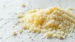 © AlfaSmart - Grated Parmesan Cheese: Close-Up Texture and Culinary Delight