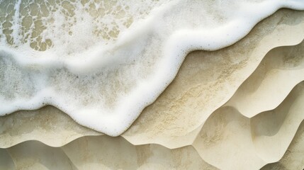 Wall Mural - Top view of beach sand texture with a blend of light tan colors and soft grains