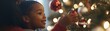 © sungedi - Young Girl Gazing at a Christmas Ornament on a Decorated Tree