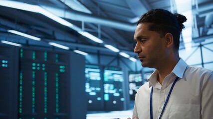 Poster - software developer walking in data center, managing and maintaining databases, ensuring data integri