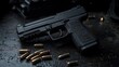 © leymart - A black handgun with a magazine and bullets on a dark surface.