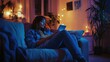 © Pon - A woman sitting cross-legged on a sofa, leaning back on her partner’s shoulder, both looking at a tablet as they enjoy a peaceful evening together