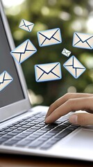 Poster - A person's hands are actively typing on a laptop while virtual email icons hover above the screen in a contemporary office setting