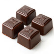 © Nirmal - The nut chocolate,Directly above shot of cherries in box against white background,Pile of chocolate square candies with cocoa filling isolated on a white background.