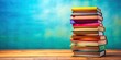 © lapeepon - Colorful stack of books with varied titles on vibrant background, education, knowledge, reading, literature, stack, books