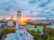 Summer Yekaterinburg, Temple of the Ascension and Temple on Blood in beautiful clear sunset.