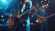 © kardaska - Guitarist playing electric guitar on stage during music concert