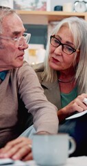 Wall Mural - Home, budget and frustrated senior couple on sofa with financial planning, savings and retirement stress. Old man, woman and discussion in house for mortgage debt, life insurance or bills on couch