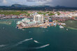 Aerial drone view of commercial pier and fisherman village at Semporna, a city on east coast of Sabah in Malaysia, Tawau District, Borneo island