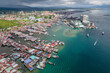 Aerial drone view of commercial pier and fisherman village at Semporna, a city on east coast of Sabah in Malaysia, Tawau District, Borneo island